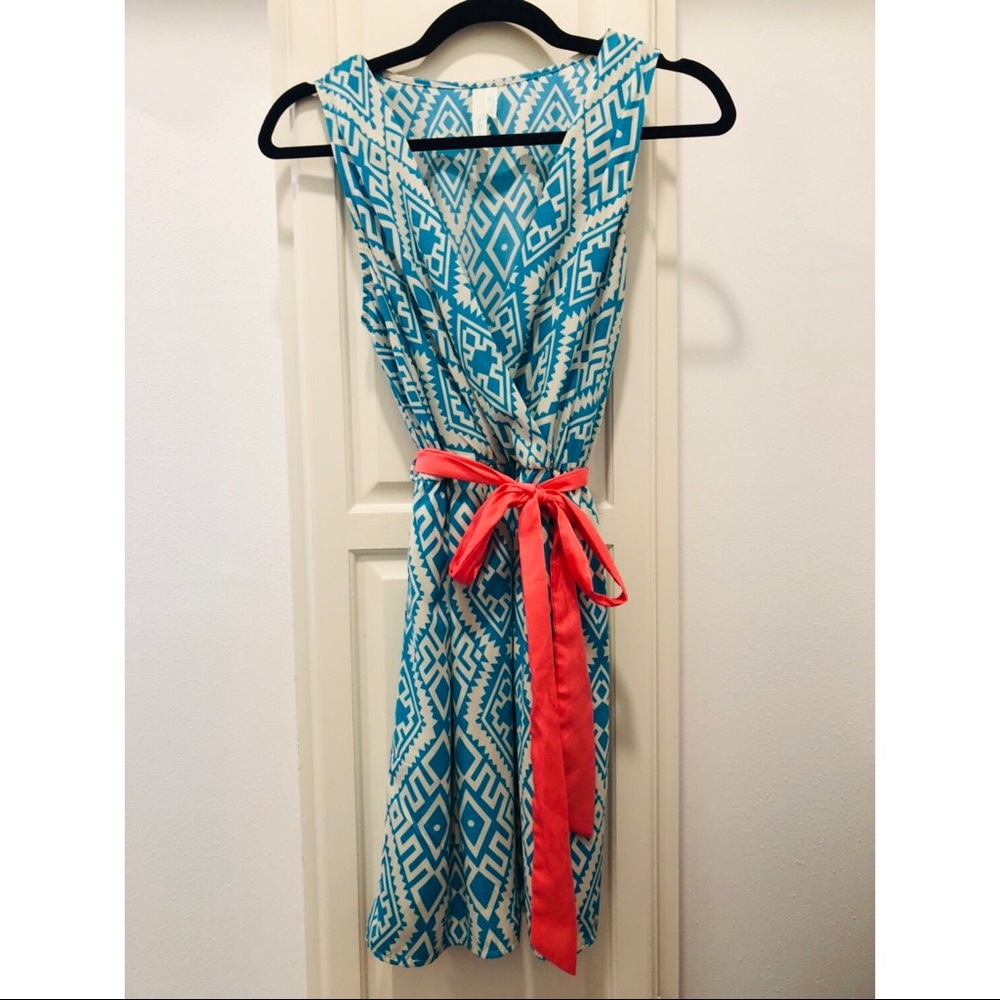 Fun blue patterned dress, with coral waist tie